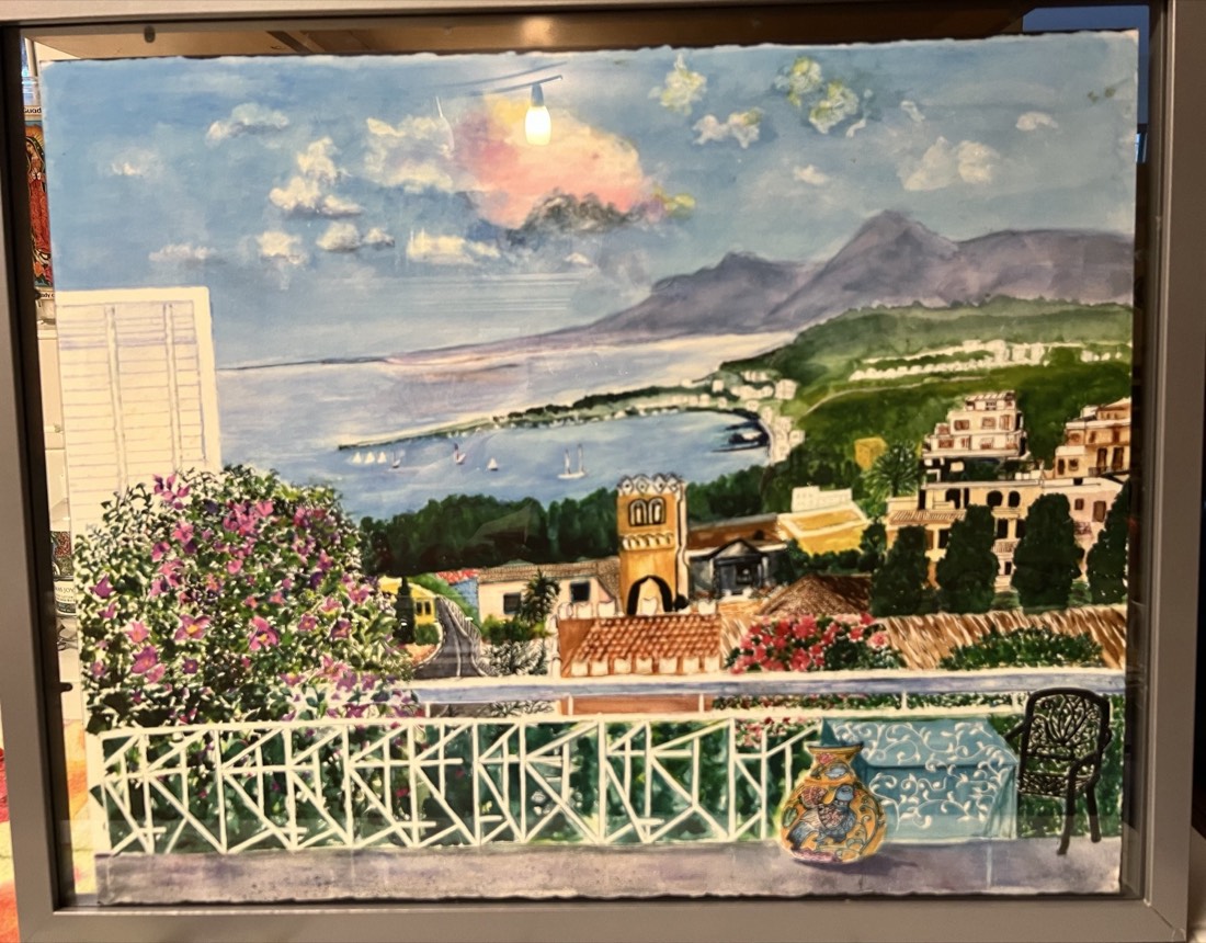 Watercolor of a Mediterranean hillside and rooftops at sunset by Jean Richards
